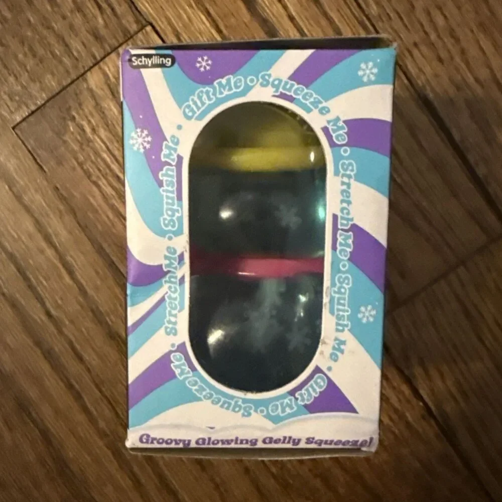 NeeDoh Groovy The Glowman Blue Pink Snowman Squishmas Nee Doh Christmas